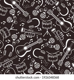 Seamless pattern with musical instruments in doodle style.