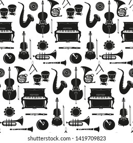 Seamless pattern with musical instruments on the white background. Vector illustration.