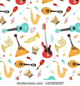 Seamless pattern with musical instruments on the white background. Vector illustration.