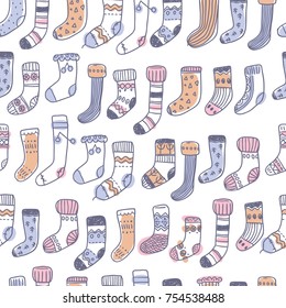 Seamless pattern with naive cute doodle socks. Scandinavian style. Sketchy craft simple style.