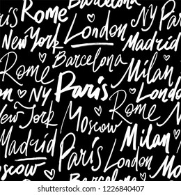 Seamless pattern with names of world cities Paris, Madrid, Barcelona, Rome, Milan, London, Moscow and New York. Modern hand drawn brush calligraphy illustration