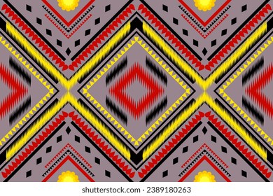 Seamless pattern of Native American geometric shapes in red, yellow, and black on a gray background.