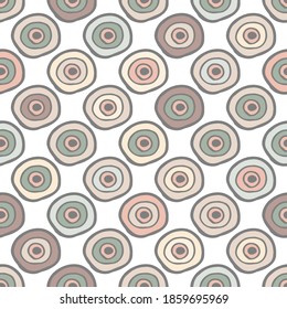 Seamless pattern with neutral colored hand drawn doodle circles on white background