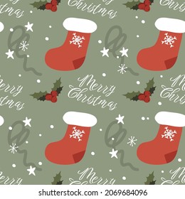 Seamless pattern with New Year and Christmas themes and attributes. Socks, mistletoe, snowflakes, inscription, lollipops, bells. For printing on fabric, paper, ceramics, stationery, packaging paper