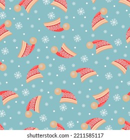 Seamless pattern New Year's red hats with a bubo, a pattern on the hats. Snowflakes on a colored background. Vector illustration.