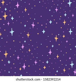 Seamless pattern night sky with colorful stars. Vector illustration Wallpaper for children's room, wrapping paper or print on textiles.
