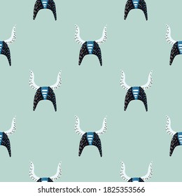 Patrón sin foco con siluetas de casco de visión noruego. Fondo azul claro. Impresión nórdica de color azul marino y blanco. Para el diseño de tejidos, impresión textil, envoltura, cubierta. Ilustración vectorial.