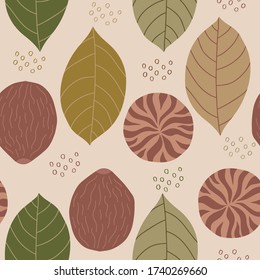 Seamless pattern with nutmegs and leaves. Healthy diet. Modern background for packaging, ads, labels and other designs. Hand drawn illustration.