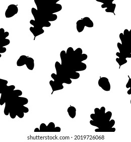 Seamless pattern oak leaves and acorns silhouettes vector illustration