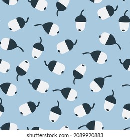 Seamless pattern with oak leaves acorns on sky blue background. Autumn concept. For surface design and other design projects