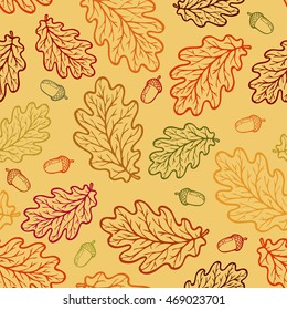 seamless pattern from oak leaves and acorns in autumn colors