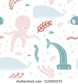 Seamless pattern with an octopus, a hammerhead fish, creepers, seashells and other marine elements. Underwater elements collection. Undersea world theme concept. Vector illustration.