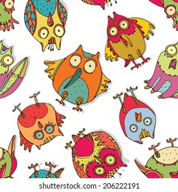 Seamless pattern with odd colorful birds and owls