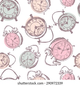 Seamless pattern with old alarm clock.