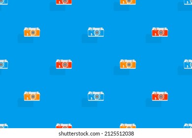 Seamless pattern from old drawn cameras. Background on the theme of photography and photographic equipment.