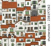 Seamless pattern of old houses. Hand drawn sketch. Vector illustration.