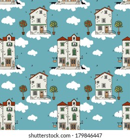 Seamless pattern of old houses. Hand drawn sketch. Vector illustration.