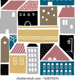 Seamless pattern with old town buildings. Vector wallpaper. Colorful illustration of city houses.