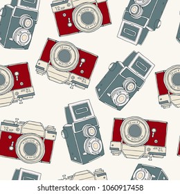 Seamless pattern with old vector retro hand drawn sketch hipster photo camera. Vintage doodle kids illustration for design, print for t-shirt, poster, card, wrapping paper. Twin lens. Minimalism.