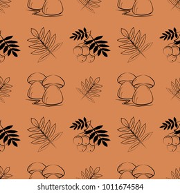 Seamless pattern on autumn themes with drawings of mushrooms and twigs of mountain ash