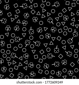 Seamless pattern on a black background. Clover and geometric shapes. Design for fabric, packaging, papers. Vector illustration