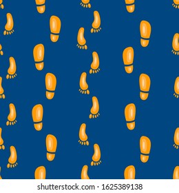 seamless pattern on a blue background feet, footprints from shoes and legs, a trail in gold color, for design and fabrics