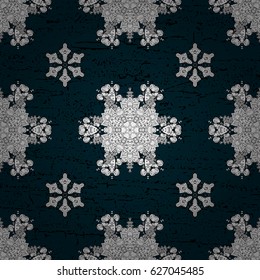 Seamless pattern on blue background with white elements. Seamless classic vector white pattern. Classic vintage background. Traditional orient ornament.