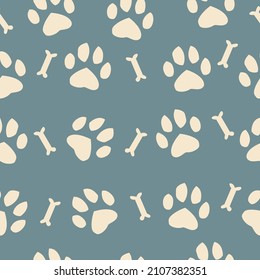 Seamless pattern on a dark gray background from dog paws and dog food into bone shapes. Vector illustration for any products for pets. 