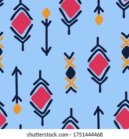 Seamless pattern on ethnic motifs on a blue background. Suitable for gift paper, wallpaper, textile.