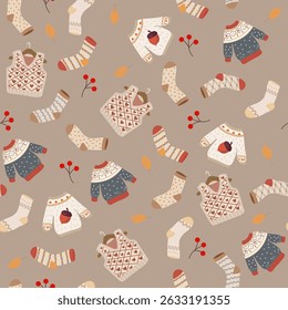 
Seamless pattern on fall theme pattern with socks and sweaters warm clothes for cozy and warm fall vector