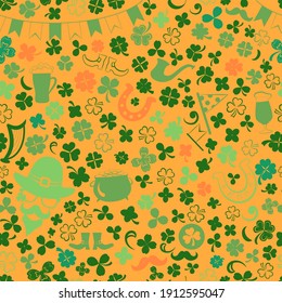 Seamless pattern on St. Patrick's Day made of clover leaves and other symbols in green and yellow colors