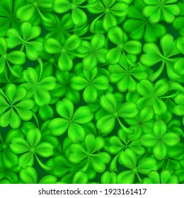 Seamless pattern on St. Patrick's Day made of realistic clover leaves in green colors with shadows