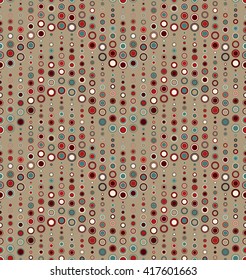 Seamless pattern on a tan background. Has the shape of a wave. Consists of geometric elements of round shape in color. Useful as design element for texture, pattern and artistic compositions.