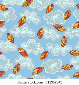 Seamless pattern on the theme of autumn with clouds , the maple leaf 

 Seamless pattern on the theme of autumn with clouds and leaves against the sky