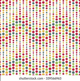Seamless pattern on a white background. Has the shape of a wave. Consists of geometric elements of round shape in color. Useful as design element for texture, pattern and artistic compositions.