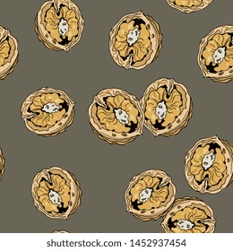 Seamless pattern with open halves of walnuts. Hand drawn colored sketch.