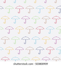 Seamless pattern with open umbrellas