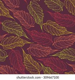 Seamless pattern with openwork autumn leaves of yellow and pink on a dark background. Vector illustration.