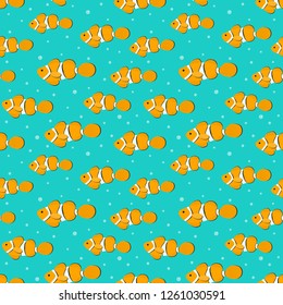 Seamless pattern with orange aquarium fish. There are clown fishes in the picture. Vector illustration on a turquoise background.
