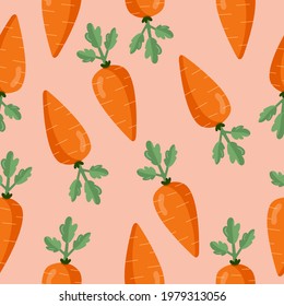 Seamless pattern orange carrot with green leaves