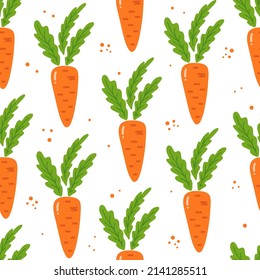 Seamless pattern of orange carrots and greens on a white background