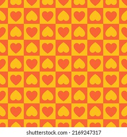Seamless pattern with orange checkerboard and hearts.