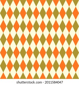 Seamless pattern with orange and green rhombuses