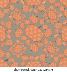 Seamless pattern with orange pumpkins. Pastel colours. Green background. Flat style vector illustration.