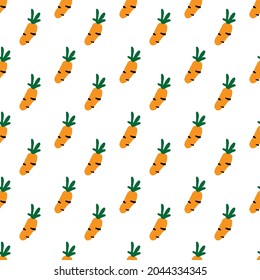Seamless pattern with orange vegetables for printing on fabric.carrots on white background.
