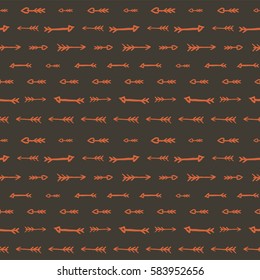 Seamless pattern with orange watercolor arrows on brown background. Hand drawn vector illustration