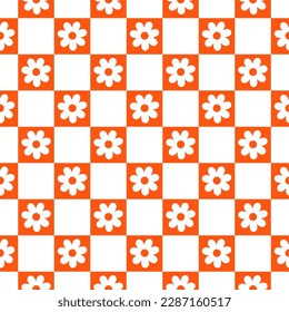 Seamless pattern with orange and white squares and flowers
