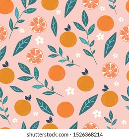 Seamless pattern with oranges and floral elements and leaves on pink background. Wallpaper, packaging paper, wrapping paper, fabric design.