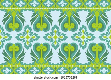 seamless pattern ornament design in blue and green color. javanes and indian ornament bacground design. vintage motif pattern for textile and decoration. 