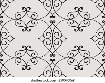 Seamless pattern. Ornament of fine lines and curls in gray tones.
